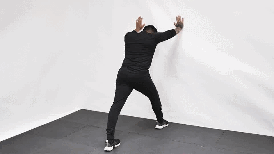 Wall calf stretch demonstration